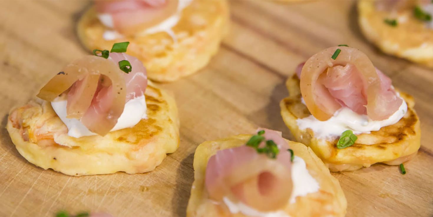 Kumera pancakes with tea smoked cobia, herbs and crème fraiche